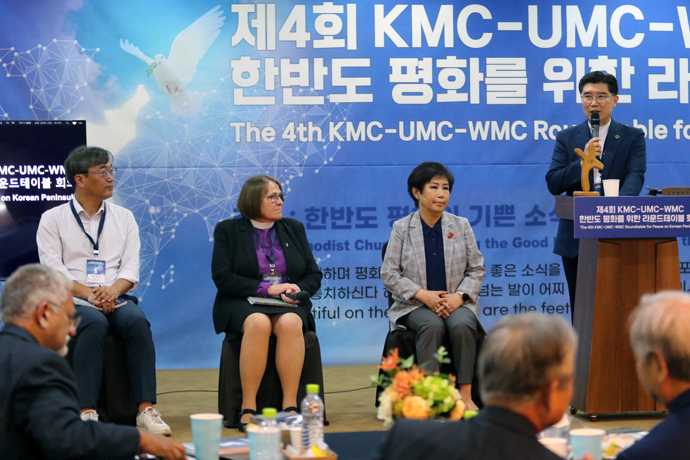 The Rev. Nam-Byung Jeon (left), general secretary of Together with the Afflicted, retired United Methodist Bishop Rosemary Wenner (center) and the Rev. Hyang-Ja Lim, principal of Heavenly Dream Academy, prepare to take questions during a Q&A session at the Fourth Roundtable for Peace on the Korean Peninsula held in Seoul, South Korea, Aug. 29-30. On the far right is the Rev. Dong-Hwa Tae, general secretary of the General Board of Missions of the Korean Methodist Church. Photo by the Rev. Thomas E. Kim, UM News.