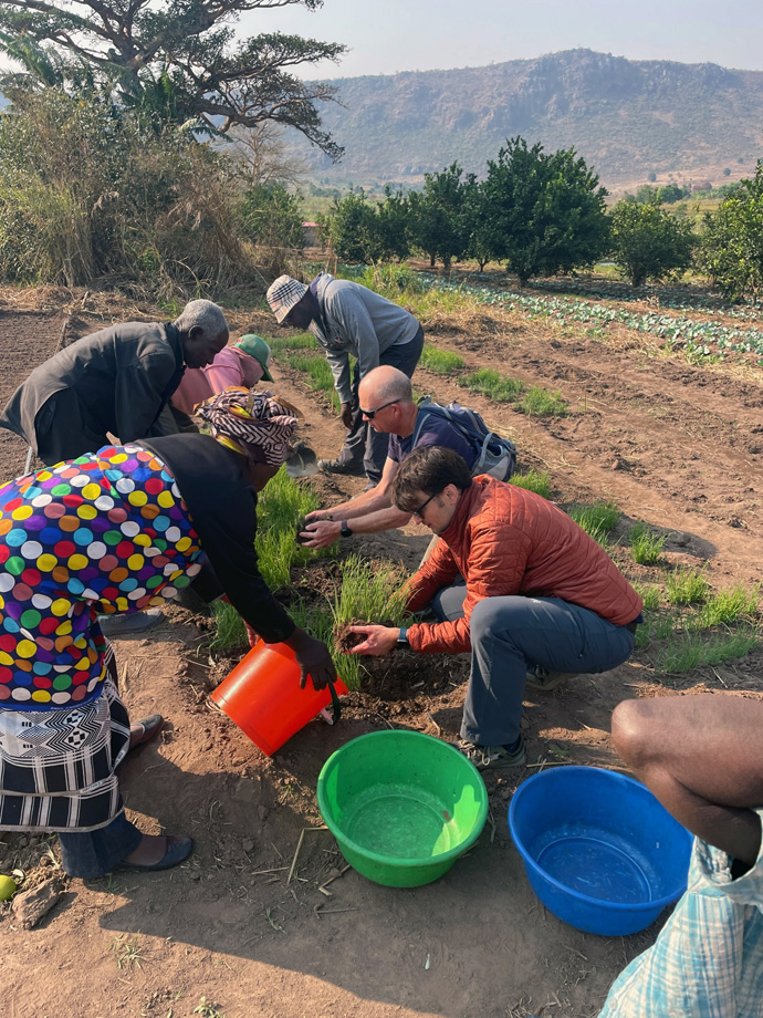 Members of the Mountain Sky Conference help with community seedling distribution from Quéssua Farm with missionary Kutela Katembo. A team from the conference traveled in July to East Angola and the Quéssua Mission, its first post-COVID mission trip. Photo courtesy of the Rev. Jared Stine.