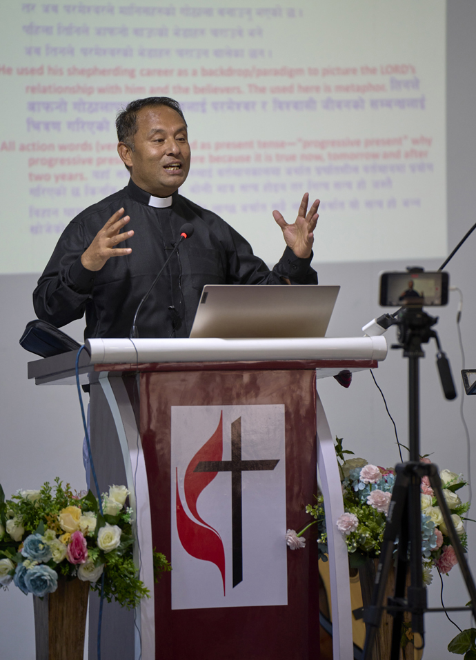 The Rev. Jeewan Lama preaches during worship May 20 at Hebron United Methodist Church in Lalitpur, Nepal. Lama and his wife, Sabina, founded the congregation in 2005, one of several that emerged from a short-lived mission initiative of the United Methodist Board of Global Ministries. It’s the only one that remains United Methodist today. Photo by Paul Jeffrey, UM News.