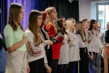 Teens and youth from Ukraine who participate in the activities of the United Methodist “Meeting Point CLUB” in Cluj-Napoca, Romania, share their music and songs in a concert. Photo by Sergiu Nicola, courtesy of The United Methodist Church in Romania.  