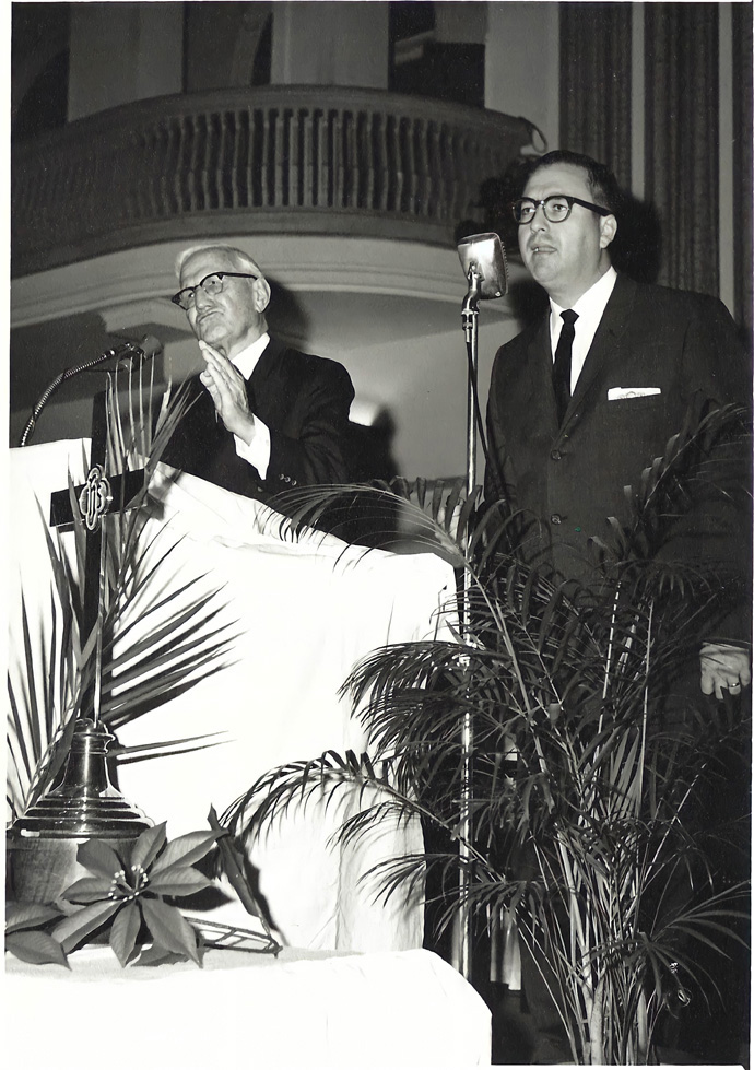The Rev. E. Stanley Jones (left) preaches and the Rev. Roberto Escamilla provides Spanish-language interpretation during a service in Santiago, Chile, in 1968. Photo courtesy of Marlene Williams.