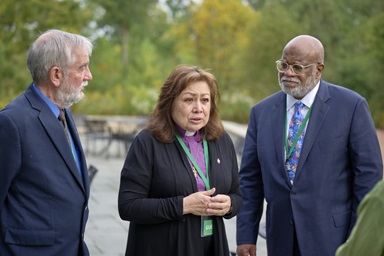 United Methodist Bishop Minerva G. Carcaño speaks to the press in Glenview, Ill., on Sept. 22, 2023, following a jury’s unanimous verdict of not guilty in her church trial. She is accompanied by her counsel in the trial: the Rev. Scott Campbell (left) and Judge Jon Gray. Carcaño is now reinstated after an 18-month suspension, but questions remain about what comes next. Photo by Paul Jeffrey, UM News. United Methodist Bishop Minerva G. Carcaño speaks to the press in Glenview, Ill., on Sept. 22, 2023, following a jury’s unanimous verdict of not guilty in her church trial. She is accompanied by her counsel in the trial: the Rev. Scott Campbell (left) and Judge Jon Gray. Carcaño is now reinstated after an 18-month suspension, but questions remain about what comes next. Photo by Paul Jeffrey, UM News.