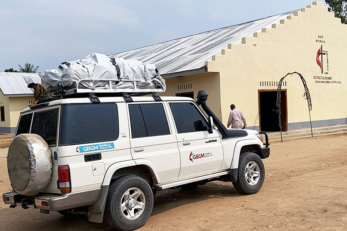 Each bishop in the Congo Central Conference, which includes four United Methodist episcopal areas covering six countries in central Africa, received an SUV with financial support from the United Methodist Board of Global Ministries. Here, one of the Land Cruisers sits in front of Victor Wetchi United Methodist Church in the Kibombo District in Congo. Photo by Chadrack Londe, UM News.