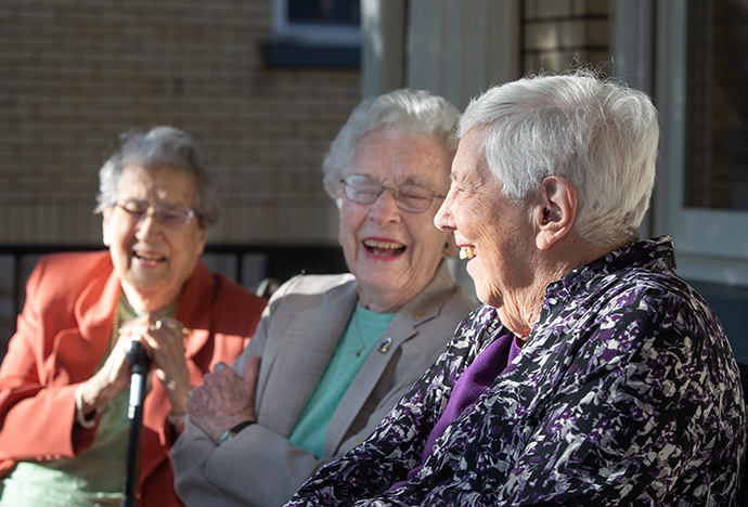 Honorees share a laugh during the dedication service for the Campbell Sohl House at Scarritt Bennett Center in Nashville, Tenn. From right are Joyce Sohl and Barbara Campbell, for whom the house is named. At left is Betty Letzig, the eldest graduate of the former Scarritt College for Christian Workers who was present at the dedication. She earned a bachelor’s degree there in 1950 followed by a master’s degree in 1968. Photo by Mike DuBose, UM News.