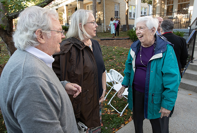 Joyce Sohl (right) visits with the Rev. Gordon Johnson and his wife, Candy Richter, before the dedication service for the Campbell Sohl House at Scarritt Bennett Center in Nashville, Tenn. Johnson and Richter served as long-term volunteers at the center. Photo by Mike DuBose, UM News.