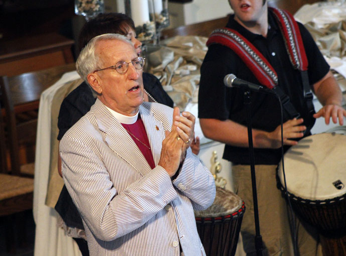 Bishop William Boyd Grove joins in worship at the 2011 West Virginia Annual Conference session. He remained active in The United Methodist Church into his 90s, including serving on a Council of Bishops task force on the denomination’s future. Grove died Oct. 27 at age 94. Photo courtesy of the West Virginia Conference. 