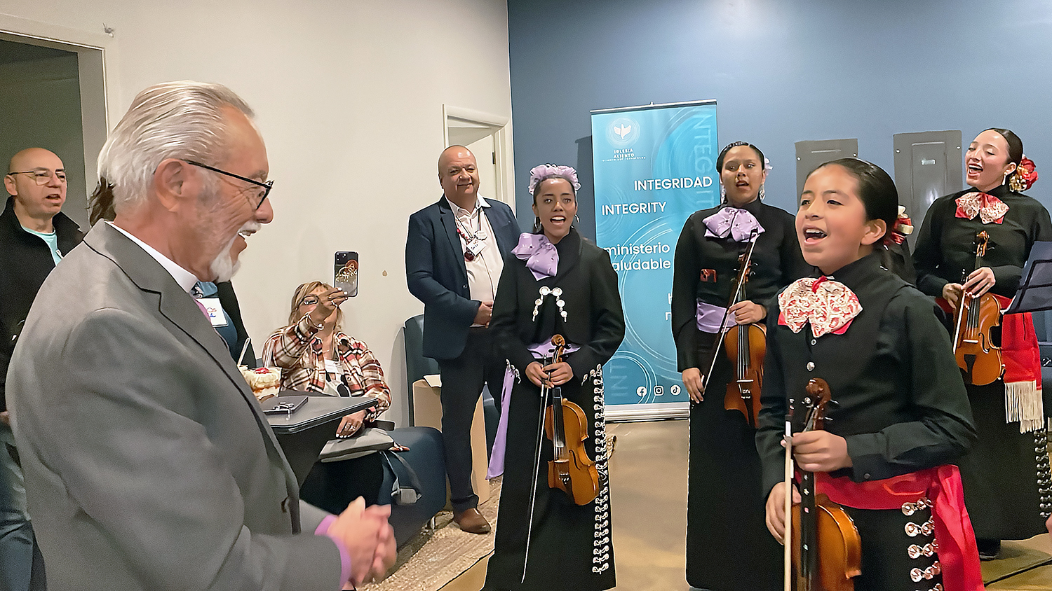 Retired Bishop Elías Galván, the first Hispanic/Latino to be elected bishop of The United Methodist Church, receives a surprise greeting from a mariachi, upon his arrival at First United Methodist Church of Phoenix. Photo by the Rev. Gustavo Vasquez, UM News.