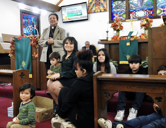 The children’s message concludes at La Trinidad United Methodist Church, on Nov. 19. La Trinidad has provided worship space to fellow Seguin, Texas, residents who decided to stay United Methodist after their church disaffiliated. Photo by Sam Hodges, UM News.