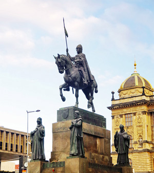 Sculptor Josef Václav Myslbek created a memorial to St. Wenceslas in Wenceslas Square in Prague. It was first unveiled in 1913, but not completed until 1924, two years after the sculptor’s death. The mounted saint is accompanied by other Czech patron saints carved into the statue’s ornate base, including St. Ludmila, Wenceslas’ grandmother. Photo by Ales Tosovsky, courtesy of Wikimedia Commons