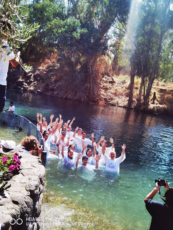 A water baptism ceremony at the Jordan River organized by Israel First United Methodist Church in Tel Aviv, Israel, Sept. 18, 2022. The church has over 100 members, around 70 of whom are called affiliate members or those who have United Methodist ties in the Philippines. Photo courtesy of Israel First United Methodist Church Facebook page.  