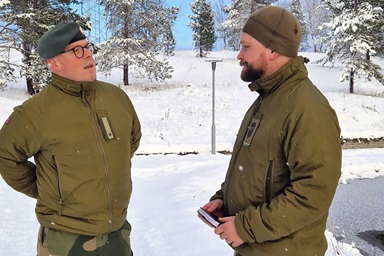 The Rev. Jon Erik Bråthen (left) enjoys chatting with everyone he meets. Based at Porsangmoen near Lakselv in Finnmark, Norway, Bråthen is a military chaplain whose “congregants” include Sámi-speaking peoples who practice semi-nomadic reindeer herding. Photo courtesy of Emil Skartveit. The Rev. Jon Erik Bråthen (left) enjoys chatting with everyone he meets. Based at Porsangmoen near Lakselv in Finnmark, Norway, Bråthen is a military chaplain whose “congregants” include Sámi-speaking peoples who practice semi-nomadic reindeer herding. Photo courtesy of Emil Skartveit.