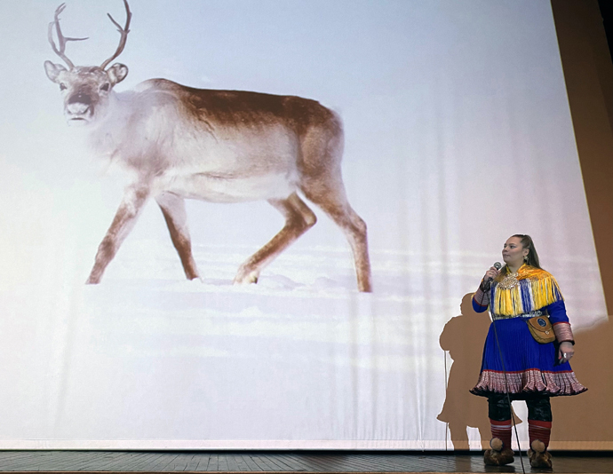 Inga Márjá Lango teaches an assembly about, among other things, the importance of reindeer husbandry. Lango, a female Sámi soldier from Kautokeino, first met the Rev. Jon Erik Bråthen when she came to him after a nurse had downplayed her concerns about having her culture disrespected by military officers. Photo courtesy of Emil Skartveit.