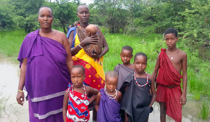 United Methodist Pastor Paulina Koinasai, who leads a United Methodist church in the Masai District in Tanzania, is shown with her family. She lost her home and livestock in the recent flooding, and her congregation’s temporary church building was washed away. Photo by Samsoni Kinoka, Masai District.