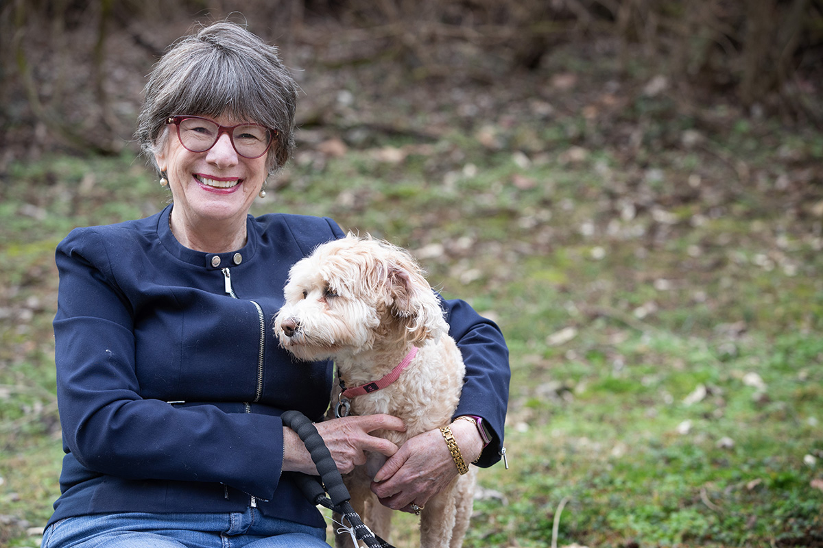 New Testament scholar Amy-Jill Levine enjoys quality time with Morey, her labradoodle. Levine is the author of a popular series of books about the New Testament, published by Abingdon Press, an imprint of The United Methodist Publishing House. Photo by Mike DuBose, UM News.
