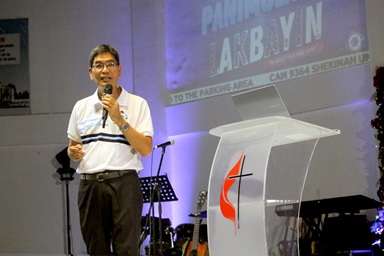 The Rev. Jestril Alvarado speaks at Seed of Faith United Methodist Church in Santa Maria, Philippines, during a gathering to launch a new discipleship program. Called “Lakbayin” or “journey,” the Manila Area program aims to make disciples as mandated by the Great Commission (Matthew 28). Photo by Gladys P. Mangiduyos, UM News.  The Rev. Jestril Alvarado speaks at Seed of Faith United Methodist Church in Santa Maria, Philippines, during a gathering to launch a new discipleship program. Called “Lakbayin” or “journey,” the Manila Area program aims to make disciples as mandated by the Great Commission (Matthew 28). Photo by Gladys P. Mangiduyos, UM News.