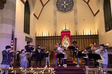 Students from the Community Music Project rehearse for a 2022 Christmas concert to help Guatemalans in need of cataract surgery. File photo courtesy of Haven United Methodist Church.
