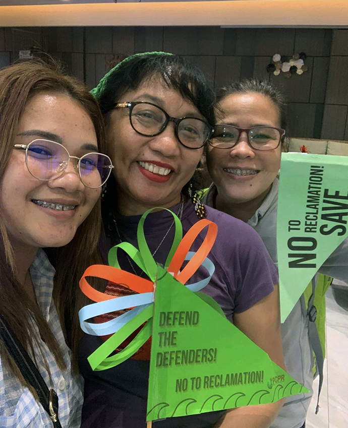 Norma P. Dollaga (center), seen here in an undated photo, poses with two fellow advocates. Dollaga has been honored for her ministry of championing justice, especially in the wake of former Philippines President Rodrigo Duterte's "war on drugs," which resulted in extrajudicial killings of poor people who allegedly sold or used illegal drugs. Photo courtesy of Norma P. Dollaga.