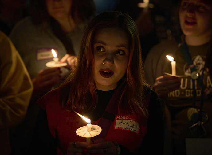 Grace Rogers from Jacksonville, Fla., a student at the Candler School of Theology in Atlanta participates in a candlelight Vigil for Creation on Earth Day, April 22, on the eve of the 2024 United Methodist General Conference in Charlotte, N.C. The service took place at the First United Methodist Church of Charlotte. Photo by Paul Jeffrey, UM News.