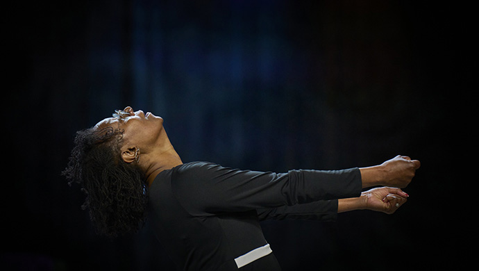 The Rev. Tisha Branch dances on April 26 during morning worship at the United Methodist General Conference in Charlotte, N.C. She is a member of the New York Conference. Photo by Paul Jeffrey, UM News.