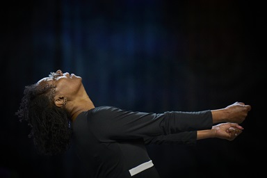 The Rev. Tisha Branch dances on April 26 during morning worship at the United Methodist General Conference in Charlotte, N.C. She is a member of the New York Conference. Photo by Paul Jeffrey, UM News.