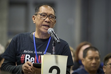 The Rev. Jonathan Ulanday, a clergy delegate from the East Mindanao Conference in the Philippines, speaks April 25 on the floor of the United Methodist General Conference in Charlotte, N.C. Ulanday said regionalization legislation allows the spirituality of The United Methodist Church to grow in a different context. Photo by Paul Jeffrey, UM News.