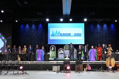 Jim Salley, president/chief executive officer of Africa University Inc. and a delegate from South Carolina, introduces the board of Africa University to the United Methodist General Conference in Charlotte, N.C. Monday April 29. Photo by Larry McCormack, UM News.