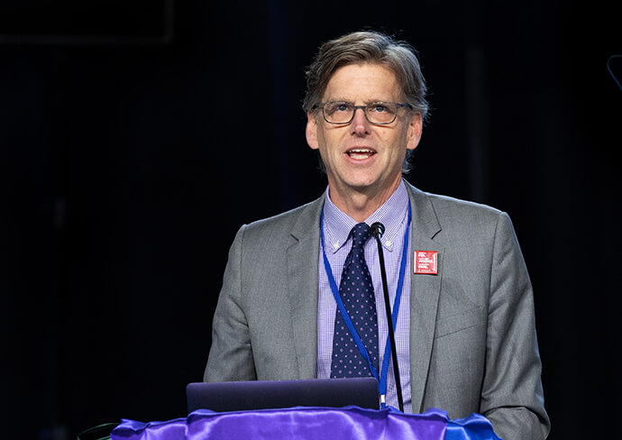 John Hill, interim general secretary of the Board of Church and Society, addresses the 2024 United Methodist General Conference in Charlotte, N.C. Photo by Mike DuBose, UM News.