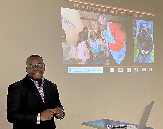 The Rev. Isaac Broune leads a photography workshop for church communicators in Harare, Zimbabwe, in 2022. File photo by Tim Tanton, UM News.
