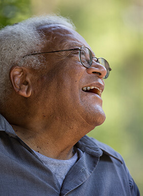 The Rev. James M. Lawson Jr. relaxes on the porch at the Children’s Defense Fund's Haley Farm in Clinton, Tenn., in 2016. File photo by Mike DuBose, UM News.