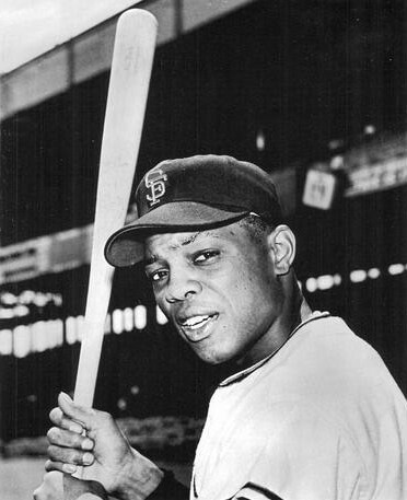 Professional baseball player Willie Mays, circa 1961, from Manny's Baseball Land via tradingcarddb.com, public domain image courtesy of Wikimedia Commons.