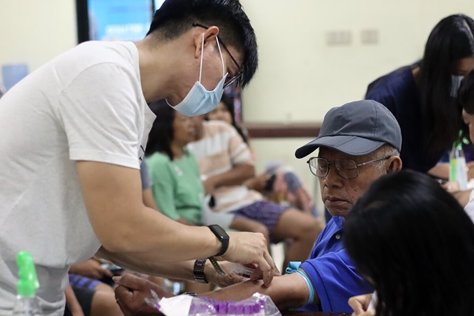 A medical technologist draws blood from a patient for testing during a medical mission hosted by the Davao Episcopal Area at Spottswood Methodist Center in Kidapawan, Philippines. The outreach event was organized to coincide with the Mindanao Philippines Annual Conference June 21-22. Photo courtesy of Davao Episcopal Area Communications. A medical technologist draws blood from a patient for testing during a medical mission hosted by the Davao Episcopal Area at Spottswood Methodist Center in Kidapawan, Philippines. The outreach event was organized to coincide with the Mindanao Philippines Annual Conference June 21-22. Photo courtesy of Davao Episcopal Area Communications.