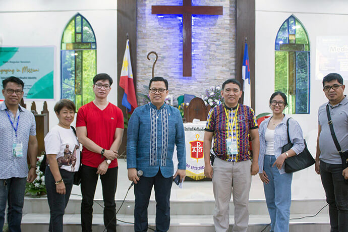 United Methodist Bishop Israel Painit (fourth from left) poses for a photo with members and organizers of a medical mission held during the Mindanao Philippines Annual Conference June 21-22. The bishop said he considers this medical mission as missio dei (mission of God). Photo courtesy of Davao Episcopal Area Communications.