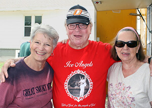 The Rev. Bill Todd (center), a retired United Methodist pastor who is one of Mosaic Church’s Ice Angels, is shown here with Beverly Hendry (left) and Sandy Sharpe, both volunteers from Grace Episcopal Church in Yukon, Okla. Volunteers from four local congregations take turns serving lunches every Wednesday near downtown Oklahoma City, as part of the Ice Angels ministry founded by a United Methodist couple nearly 15 years ago. Photo by Boyce Bowdon, UM News. 