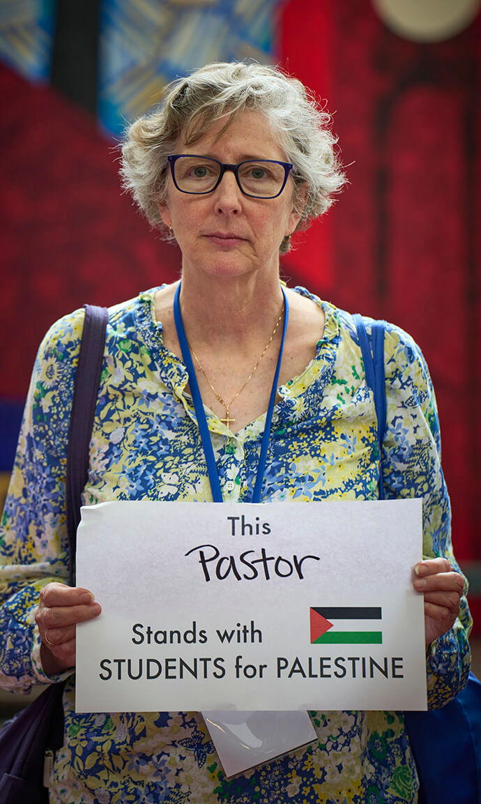 The Rev. Jane Eesley holds a sign during a demonstration in support of the people of Gaza held during the 2024 United Methodist General Conference in Charlotte, N.C., on April 30. File photo by Paul Jeffrey, UM News.