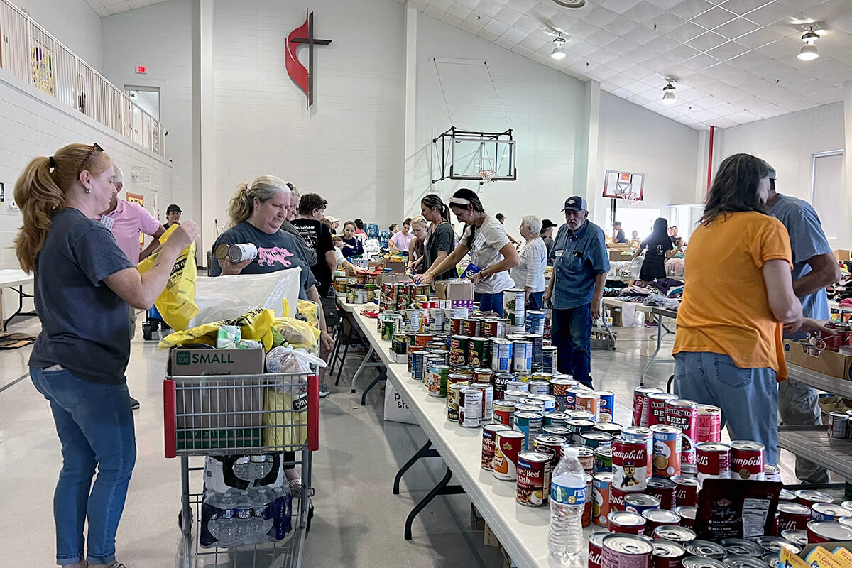 Members of Trinity United Methodist Church in Greeneville, Tenn., collect and distribute food, water and hygiene supplies to those affected by torrential rains in the aftermath of Hurricane Helene. Photo by Annette Spence, Holston Conference.