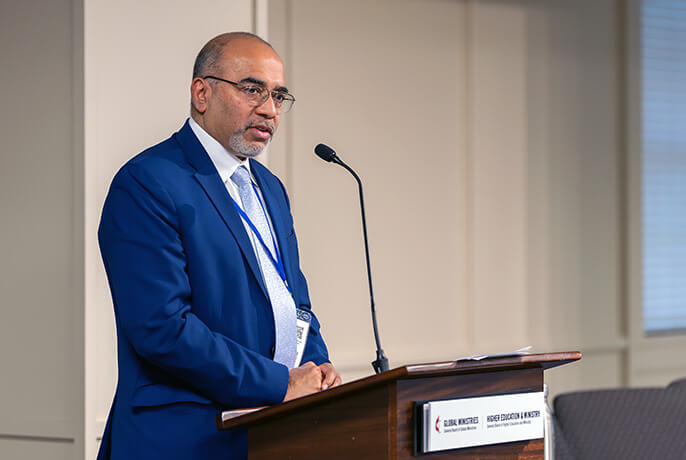 Roland Fernandes, the top executive of the United Methodist boards of Global Ministries and Higher Education and Ministry, speaks during a joint board meeting held Oct. 14-17 in Nashville, Tenn. He encouraged board members and agency employees to “allow hope and not anxiety to direct our sight.” Photo by Adam Bowers, United Methodist Board of Global Ministries.