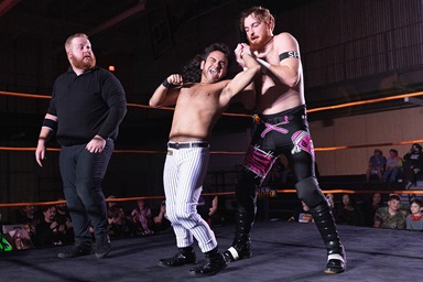 Rolando Perez (center) grimaces during a wrestling match with Jamesen Shook during a New South Pro Wrestling event Nov. 2 at the Priceville (Ala.) Event Center. Photo by Mike DuBose, UM News. Rolando Perez (center) grimaces during a wrestling match with Jamesen Shook during a New South Pro Wrestling event Nov. 2 at the Priceville (Ala.) Event Center. Photo by Mike DuBose, UM News.