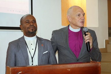 Bishop John Schol (right), who has been serving as the lead bishop of the Nigeria Episcopal Area since August, speaks after the Rev. Ande Ikimun Emmanuel is elected bishop on the first ballot during The United Methodist Church’s West Africa Central Conference meeting at the Best Western Premier Hotel in Accra, Ghana, on Dec. 7. Photo by Eveline Chikwanah, UM News. Bishop John Schol (right), who has been serving as the lead bishop of the Nigeria Episcopal Area since August, speaks after the Rev. Ande Ikimun Emmanuel is elected bishop on the first ballot during The United Methodist Church’s West Africa Central Conference meeting at the Best Western Premier Hotel in Accra, Ghana, on Dec. 7. Photo by Eveline Chikwanah, UM News.