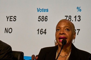 Bishop Tracy S. Malone surveys the results of General Conference delegates’ vote in favor of constitutional amendments to carry out the worldwide regionalization plan as she presides over a legislative session on April 25, 2024, in Charlotte, N.C. This year, annual conferences around the globe will hold votes on regionalization and three other amendments to the denomination’s constitution. File photo by Paul Jeffrey, UM News. Bishop Tracy S. Malone surveys the results of General Conference delegates’ vote in favor of constitutional amendments to carry out the worldwide regionalization plan as she presides over a legislative session on April 25, 2024, in Charlotte, N.C. This year, annual conferences around the globe will hold votes on regionalization and three other amendments to the denomination’s constitution. File photo by Paul Jeffrey, UM News.