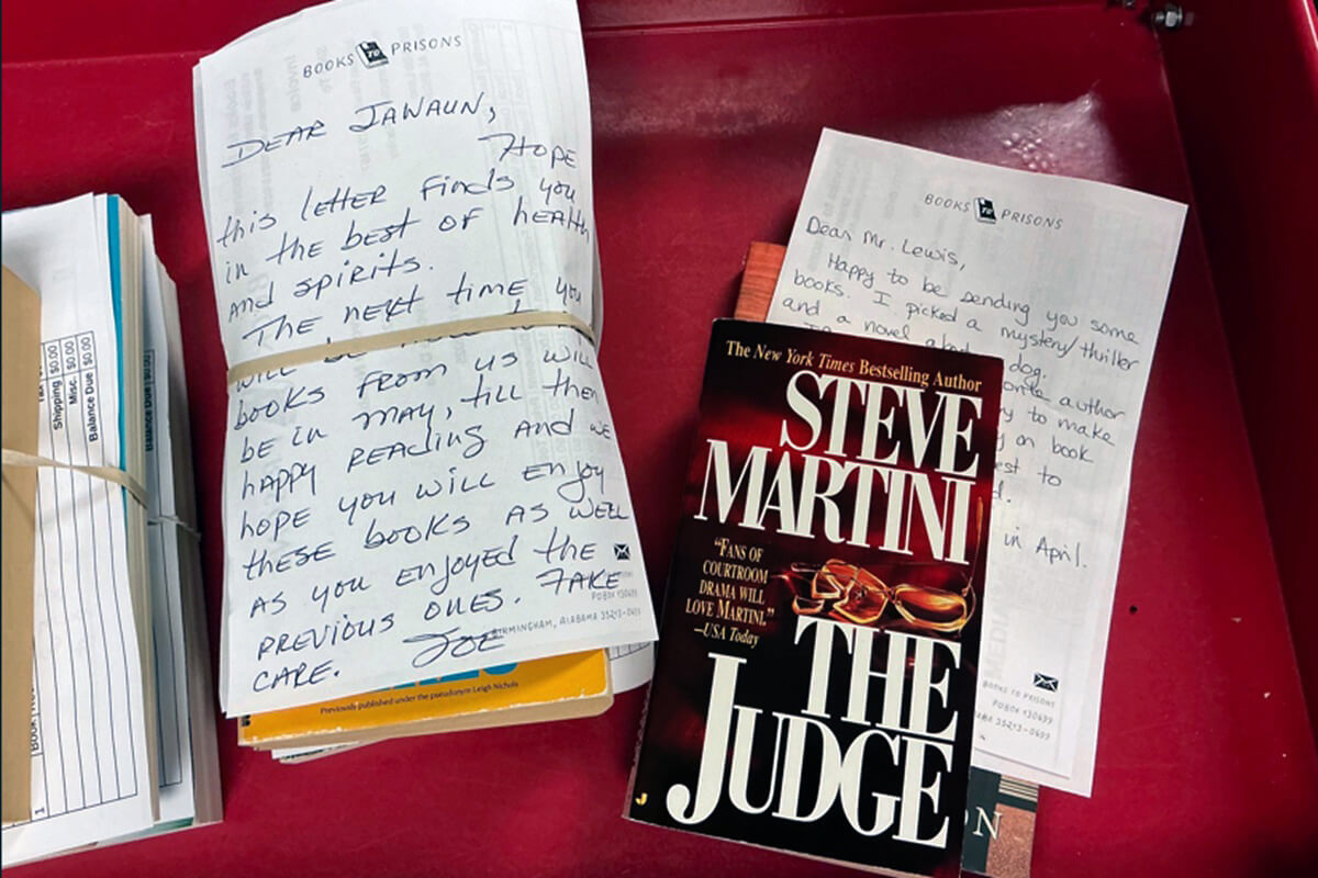 “Hope this letter finds you in the best of health and spirits.” Books requested by an inmate have been carefully packaged for shipping by Books to Prisons volunteers in Birmingham, Ala. Photo by Lilla Marigza, UM News.