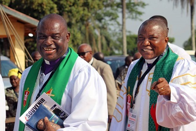 Bishop Samuel J. Quire Jr. (right), who leads The United Methodist Church’s Liberia Conference, walks beside Bishop James Boye-Caulker of the Sierra Leone Conference during the 192nd session of the Liberia Annual Conference, held Feb. 10-16 in Gbarnga, Liberia. Quire said the church was fighting for control of several sanctuaries in Liberia that were seized by members of the Global Methodist Church following the annual conference session. Photo by Priscilla Muzerengwa, United Methodist Communications. Bishop Samuel J. Quire Jr. (right), who leads The United Methodist Church’s Liberia Conference, walks beside Bishop James Boye-Caulker of the Sierra Leone Conference during the 192nd session of the Liberia Annual Conference, held Feb. 10-16 in Gbarnga, Liberia. Quire said the church was fighting for control of several sanctuaries in Liberia that were seized by members of the Global Methodist Church following the annual conference session. Photo by Priscilla Muzerengwa, United Methodist Communications.