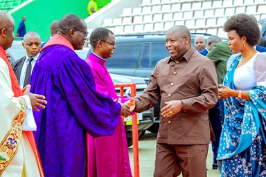 Bishops Daniel Wandabula (at left in purple robe) and Emmanuel Sinzohagera welcome Burundi President Evariste Ndayishimiye and First Lady Angeline Ndayishimiye to the installation celebration at Ingoma Stadium in Gitega, Burundi, on March 29. More than 4,000 people gathered to celebrate Sinzohagera’s installation as a United Methodist bishop in the newly created East Africa Central Conference. He will lead the Burundi-Rwanda Episcopal Area and serve as the central conference’s president. Photo by Priscilla Muzerengwa, United Methodist Communications. Bishops Daniel Wandabula (at left in purple robe) and Emmanuel Sinzohagera welcome Burundi President Evariste Ndayishimiye and First Lady Angeline Ndayishimiye to the installation celebration at Ingoma Stadium in Gitega, Burundi, on March 29. More than 4,000 people gathered to celebrate Sinzohagera’s installation as a United Methodist bishop in the newly created East Africa Central Conference. He will lead the Burundi-Rwanda Episcopal Area and serve as the central conference’s president. Photo by Priscilla Muzerengwa, United Methodist Communications.