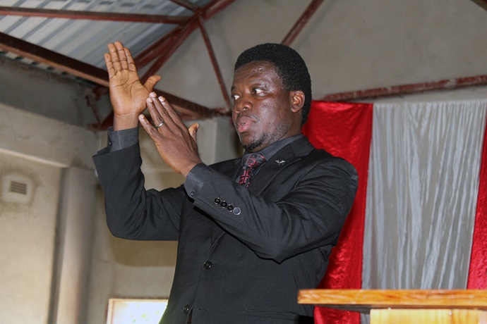 Collins Kwasi Prempeh preaches at King Solomon United Methodist Church in Mutare, Zimbabwe, on May 18. Prempeh, the first Deaf Global Missionary, will work with communities in Zimbabwe, Tanzania, Burundi, Zambia, Congo and other parts of East Africa for the next three years. Photo by Kudzai Chingwe, UM News. Collins Kwasi Prempeh preaches at King Solomon United Methodist Church in Mutare, Zimbabwe, on May 18. Prempeh, the first Deaf Global Missionary, will work with communities in Zimbabwe, Tanzania, Burundi, Zambia, Congo and other parts of East Africa for the next three years. Photo by Kudzai Chingwe, UM News.