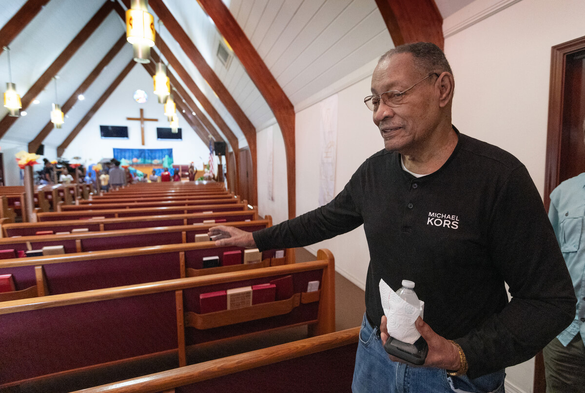 Anthony Alfred recalls the flooding from Hurricane Katrina that inundated the sanctuary at Hartzell Mt. Zion United Methodist Church. A longtime member of the church, Alfred has served as a trustee, lay leader and Sunday school teacher.