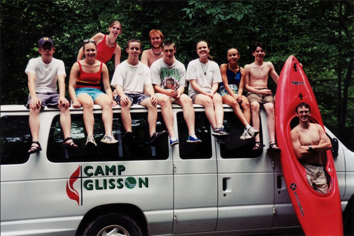 Youth attending Wilderness Week at Camp Glisson in the summer of 2000 sit on top of the camp van in Dahlonega, Ga. Photo by J. Paul Manion, former Camp Glisson staff photographer.
