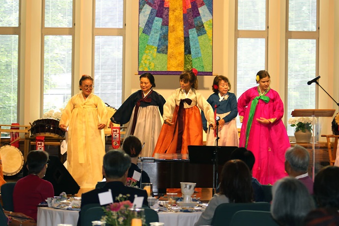 The Ohio Korean-American Pungmulnori Team dances during the opening dinner for Celebrating Methodist Missions in Ohio, Korea and Beyond on Aug. 4 at Church of the Saviour United Methodist Church in Cleveland Heights, Ohio. Photo by the Rev. Thomas E. Kim, UM News. The Ohio Korean-American Pungmulnori Team dances during the opening dinner for Celebrating Methodist Missions in Ohio, Korea and Beyond on Aug. 4 at Church of the Saviour United Methodist Church in Cleveland Heights, Ohio. Photo by the Rev. Thomas E. Kim, UM News.