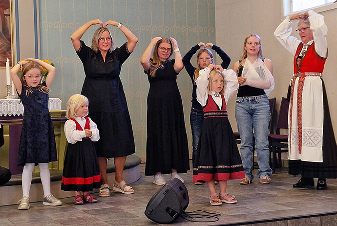 Children sing during worship at Flekkefjord United Methodist Church in Flekkefjord, Norway. It’s tradition to wear costumes at weddings, baptisms, holiday worship and other festive occasions in the country. The now-inclusive church is seeing young families increase as it rebounds after seeing members depart last year. Photo by Karl Anders Ellingsen, UM News.