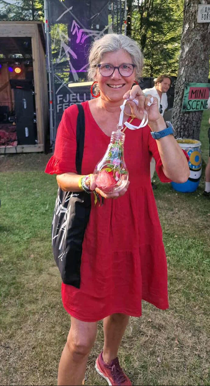 Elise Løvland shows off the award given to her this summer by the youth of Flekkefjord, Norway. The youth honored her for her support of children in Gaza and her leadership of her inclusive United Methodist congregation. Photo courtesy of Elise Løvland.