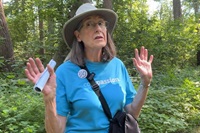 Mary Spurgeon stops to listen to the sounds of nature during Wild Worship, an outdoor gathering offered by her church, First United Methodist of Omaha. Video image by Lilla Marigza, UM News. Mary Spurgeon stops to listen to the sounds of nature during Wild Worship, an outdoor gathering offered by her church, First United Methodist of Omaha. Video image by Lilla Marigza, UM News.