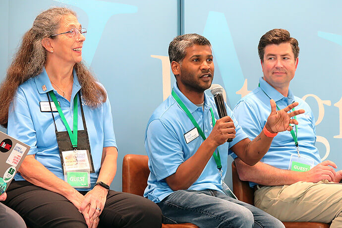 The Rev. Ryan Russell (center) talks about plans for VIM, Inc., a board that brings together United Methodist Volunteers in Mission leaders from across the United States. Russell is the chair of the North Central Jurisdiction Volunteers in Mission board as well as the national board. Beside Russell are the Rev. Tammy Kuntz, coordinator for the North Central Jurisdiction’s Volunteers in Mission, and Eddie Erwin, coordinator for the South Central Jurisdiction’s Volunteers in Mission. Photo by Heather Hahn, UM News.